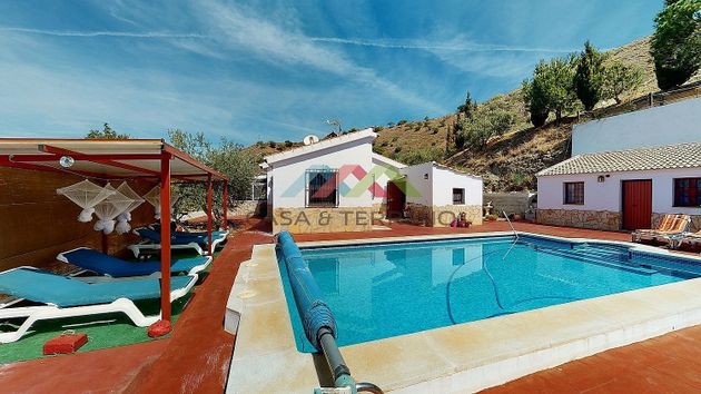 Foto 1 de Venta de chalet en Borge (El) de 4 habitaciones con terraza y piscina