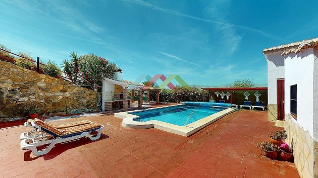 Foto 2 de Venta de chalet en Borge (El) de 4 habitaciones con terraza y piscina