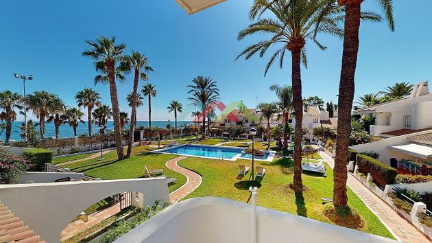 Foto 1 de Casa adossada en venda a Caleta de Vélez de 2 habitacions amb terrassa i piscina