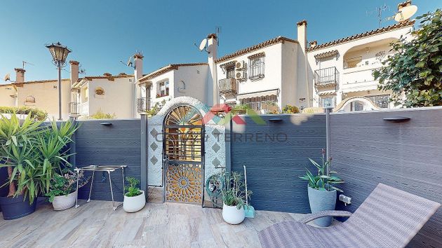 Foto 2 de Venta de casa adosada en Caleta de Vélez de 3 habitaciones con terraza y piscina