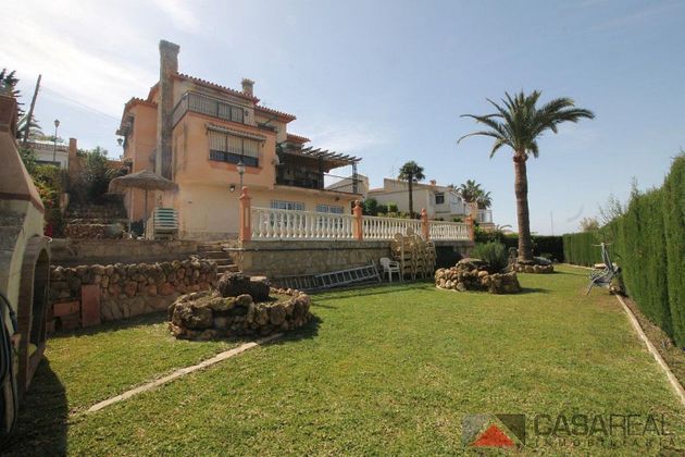 Foto 2 de Venta de chalet en Caleta de Vélez de 4 habitaciones con terraza y piscina