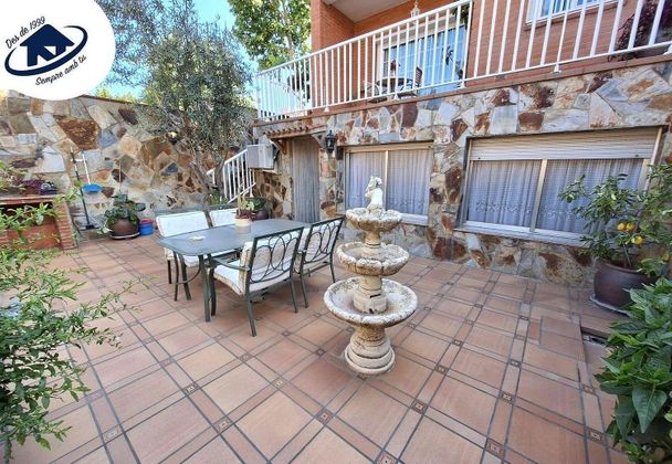 Foto 1 de Casa adosada en venta en Can Deu - La Planada - Sant Julià de 4 habitaciones con terraza y jardín