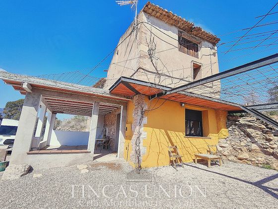 Foto 1 de Casa rural en venta en calle Del Riu de 1 habitación con terraza y jardín