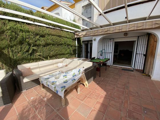 Foto 1 de Casa adosada en venta en calle Villas del Mediterraneo de 4 habitaciones con terraza y piscina