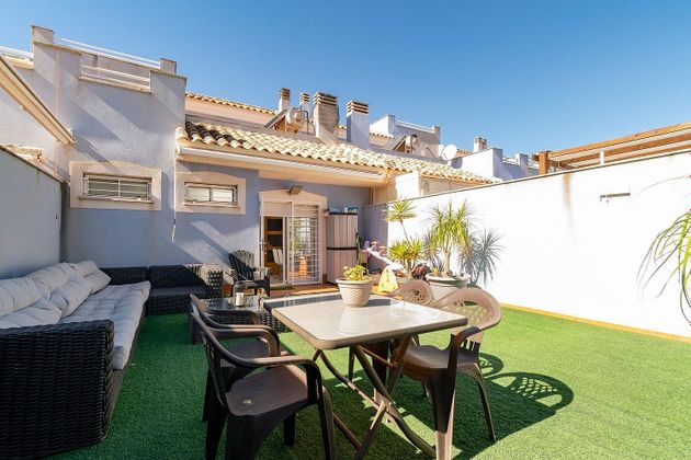 Foto 1 de Casa adosada en venta en El Algar de 3 habitaciones con terraza y garaje