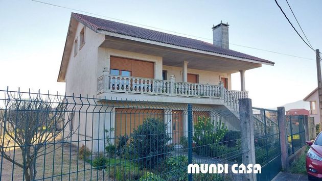 Foto 1 de Casa en venda a Boiro de 8 habitacions amb terrassa i garatge