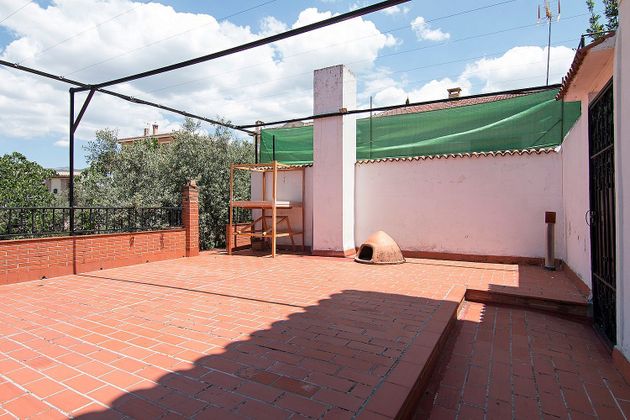Foto 1 de Casa adossada en venda a Jun de 4 habitacions amb terrassa i garatge