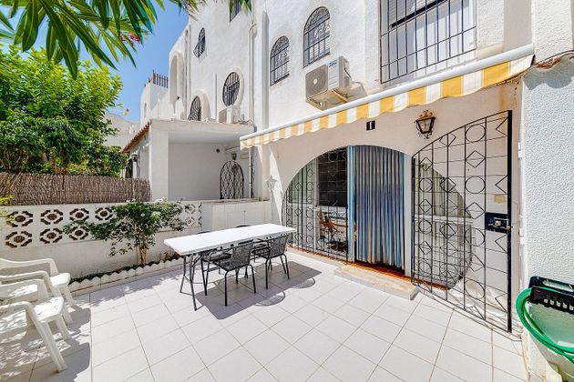 Foto 1 de Casa adossada en venda a calle Pla del Amerador de 3 habitacions amb terrassa i piscina