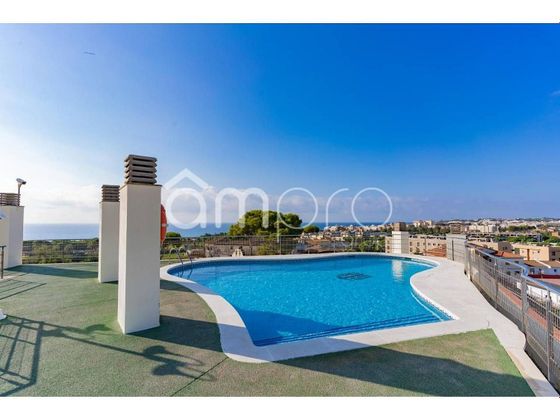 Foto 1 de Piso en venta en Clarà de 2 habitaciones con terraza y piscina