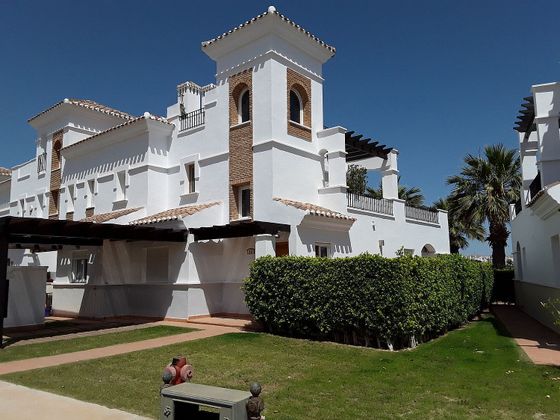Foto 1 de Casa adossada en venda a La Torre Golf de 2 habitacions amb terrassa i piscina