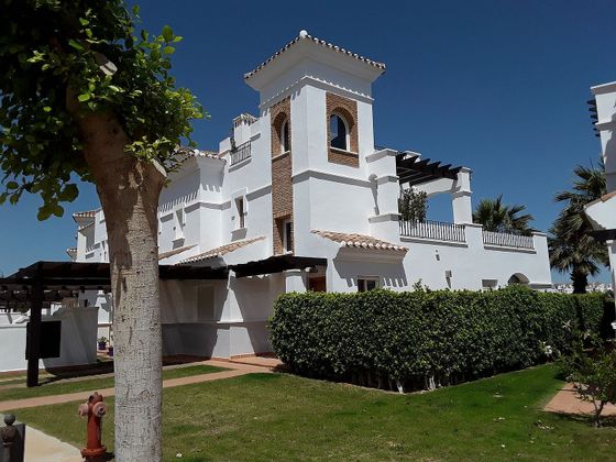 Foto 2 de Casa adossada en venda a La Torre Golf de 2 habitacions amb terrassa i piscina