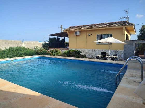 Foto 1 de Venta de chalet en Náquera de 3 habitaciones con terraza y piscina