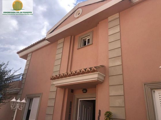 Foto 1 de Casa adosada en venta en Rincón de Loix de 4 habitaciones con terraza y piscina