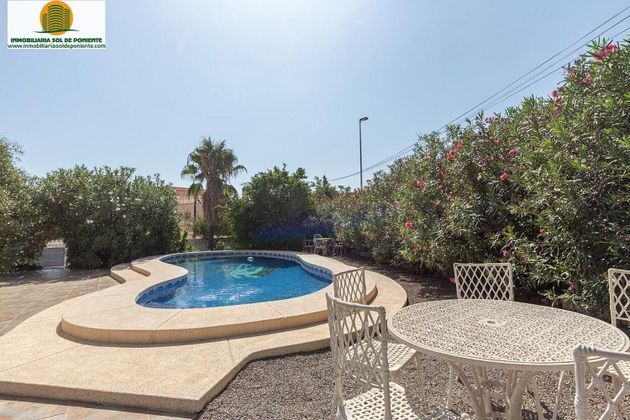 Foto 2 de Venta de casa adosada en Pueblo Poniente de 3 habitaciones con piscina y jardín