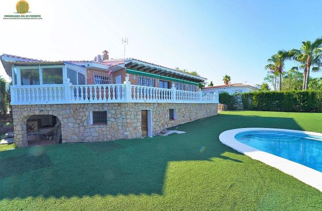 Foto 2 de Chalet en venta en Nucia (la) de 5 habitaciones con terraza y piscina