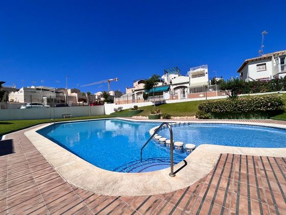 Foto 1 de Casa adosada en venta en Los Balcones - Los Altos del Edén de 2 habitaciones con terraza y piscina