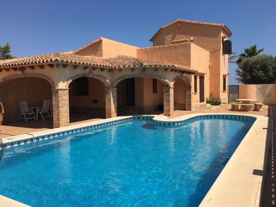 Foto 1 de Venta de casa en Devesses - Monte Pego de 3 habitaciones con terraza y piscina