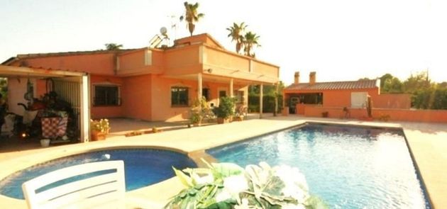Foto 1 de Chalet en venta en La Alcayna de 6 habitaciones con terraza y piscina