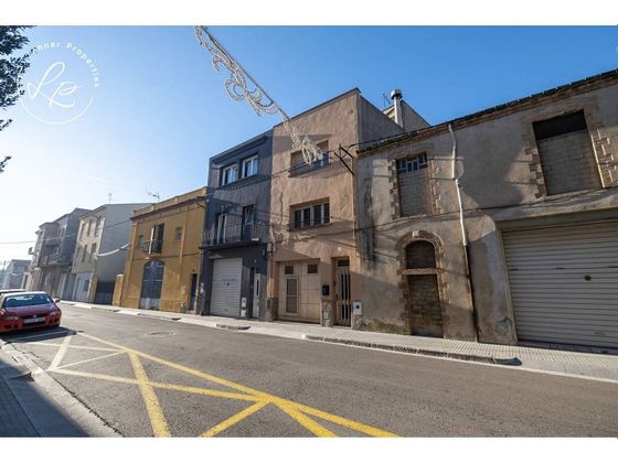 Foto 1 de Casa adossada en venda a Castelló d'Empúries poble de 4 habitacions amb terrassa i garatge