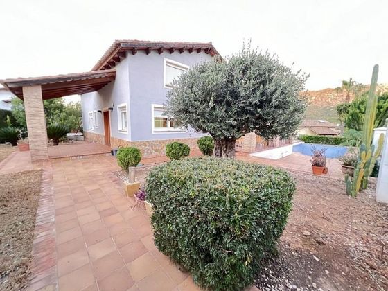Foto 2 de Casa en venta en La Barraca d' Aigües Vives de 5 habitaciones con terraza y piscina
