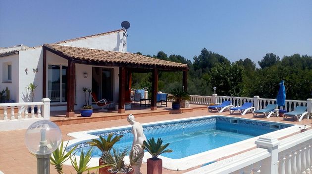 Foto 1 de Chalet en venta en L'Ametlla de Mar de 7 habitaciones con terraza y piscina