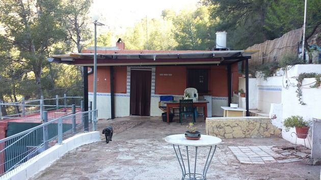 Foto 1 de Venta de casa en Olocau de 2 habitaciones con terraza y jardín