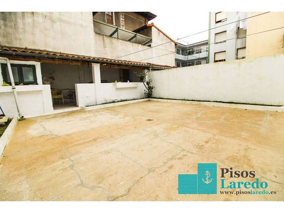 Foto 1 de Venta de casa en calle Marqués de Valdecilla de 4 habitaciones con terraza y calefacción