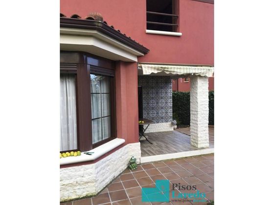 Foto 1 de Casa en venda a avenida Trasmiera de 3 habitacions amb garatge i jardí