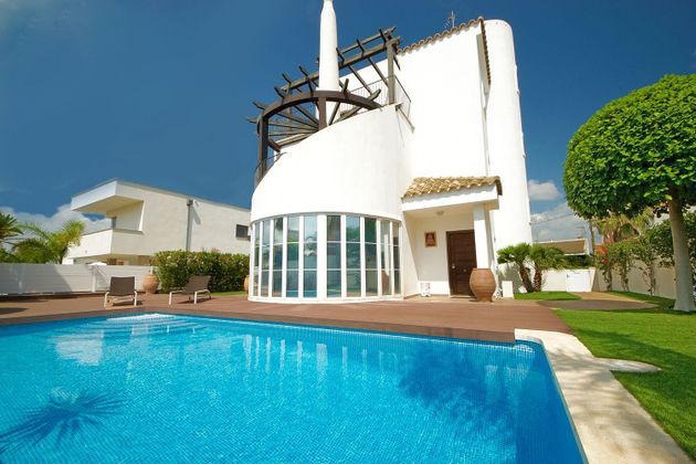 Foto 1 de Chalet en venta en Ampolla, l´ de 3 habitaciones con terraza y piscina