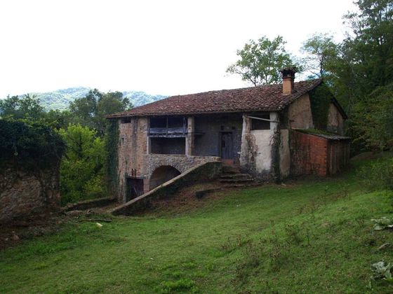 Foto 1 de Venta de casa rural en Vall de Bianya, la de 2 habitaciones con garaje y jardín
