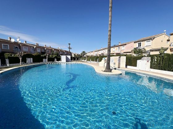 Foto 2 de Casa adosada en venta en Poblets (els) de 3 habitaciones con terraza y piscina