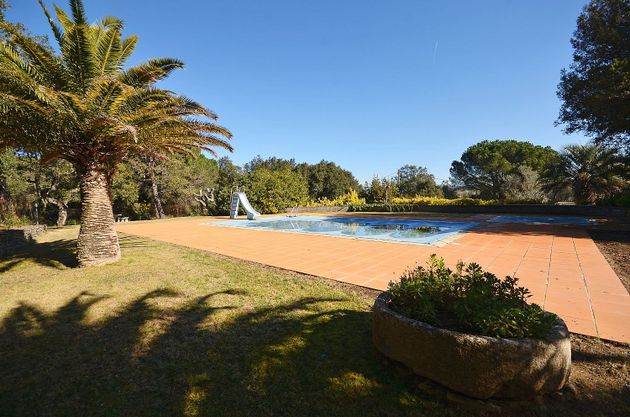 Foto 1 de Casa rural en venda a Llagostera de 6 habitacions amb piscina i jardí