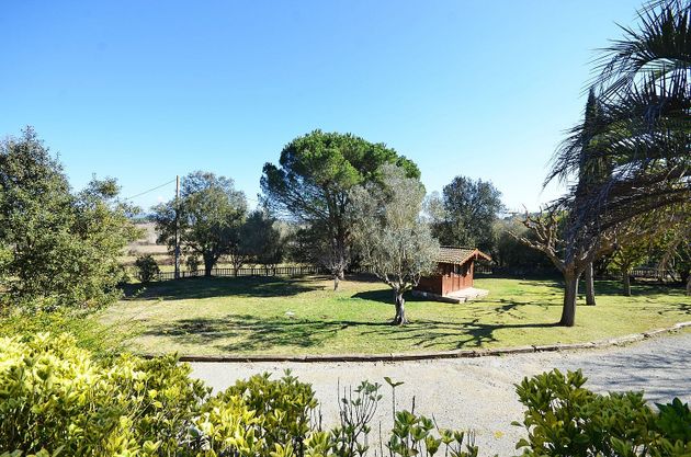 Foto 2 de Casa rural en venda a Llagostera de 6 habitacions amb piscina i jardí