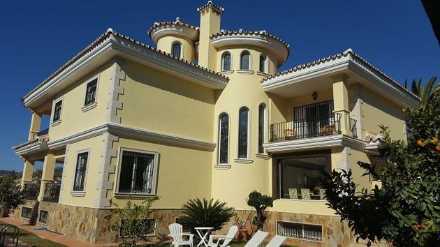 Foto 1 de Venta de casa en El Candado - El Palo de 6 habitaciones con terraza y piscina