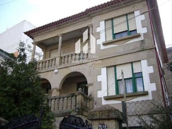 Foto 1 de Casa en venda a Bouzas - Coia de 5 habitacions amb garatge