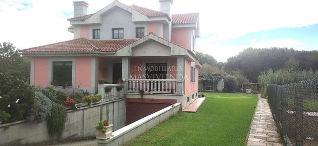 Foto 1 de Casa en venda a paseo De Castelao de 4 habitacions amb terrassa i garatge