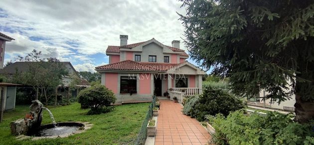 Foto 2 de Casa en venda a paseo De Castelao de 4 habitacions amb terrassa i garatge