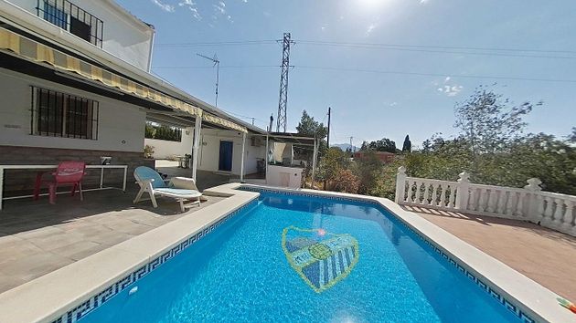 Foto 1 de Venta de casa rural en Coín de 2 habitaciones con terraza y piscina
