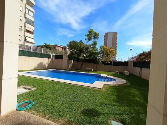 Foto 1 de Piso en venta en Sidi Ifni - Nou Alacant de 3 habitaciones con terraza y piscina