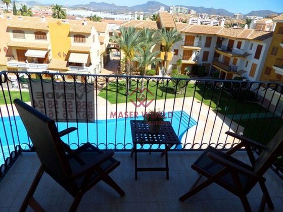 Foto 1 de Piso en venta en Puerto de Mazarrón de 2 habitaciones con piscina y jardín
