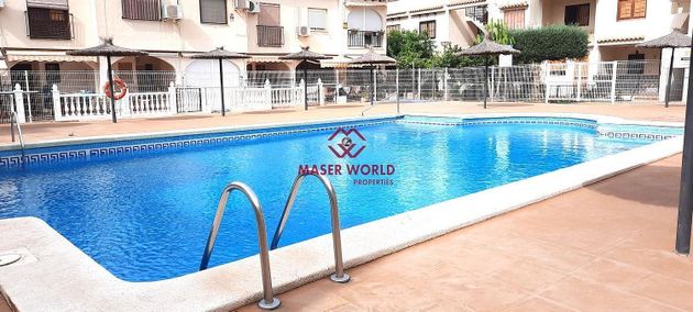 Foto 1 de Dúplex en venta en Puerto de Mazarrón de 2 habitaciones con terraza y piscina