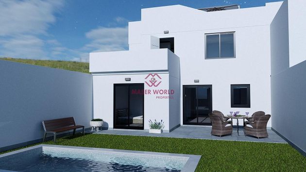 Foto 1 de Casa adossada en venda a Los Belones de 4 habitacions amb terrassa i piscina