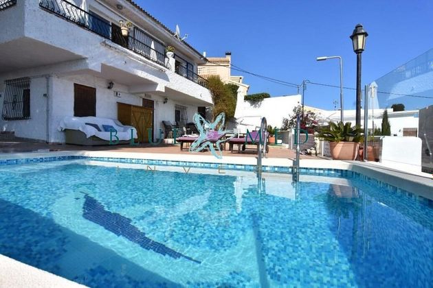 Foto 1 de Chalet en venta en calle Isla del Aire de 3 habitaciones con terraza y piscina