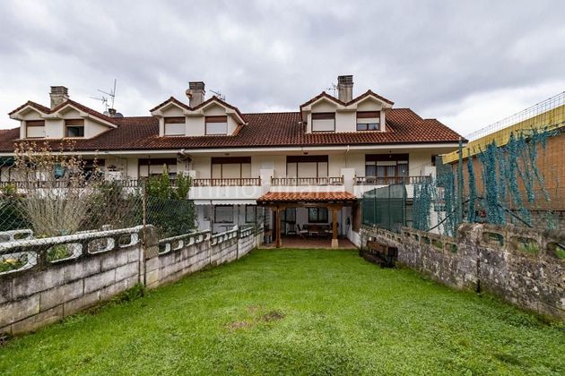 Foto 1 de Casa adossada en venda a Argoños de 4 habitacions amb terrassa i garatge