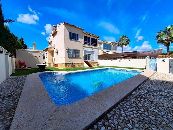 Foto 1 de Venta de chalet en L'Albir-Zona Playa de 3 habitaciones con terraza y piscina