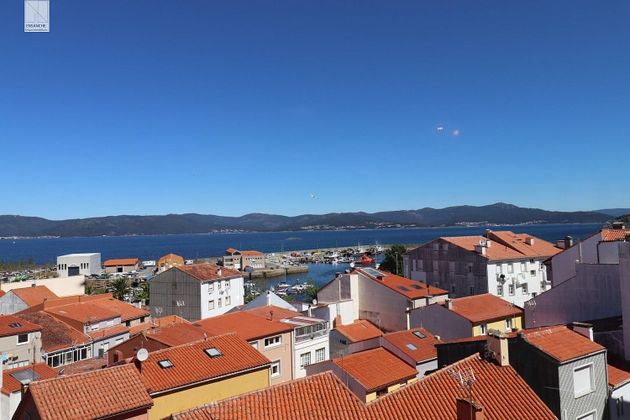 Foto 2 de Venta de piso en Porto do Son de 4 habitaciones con balcón