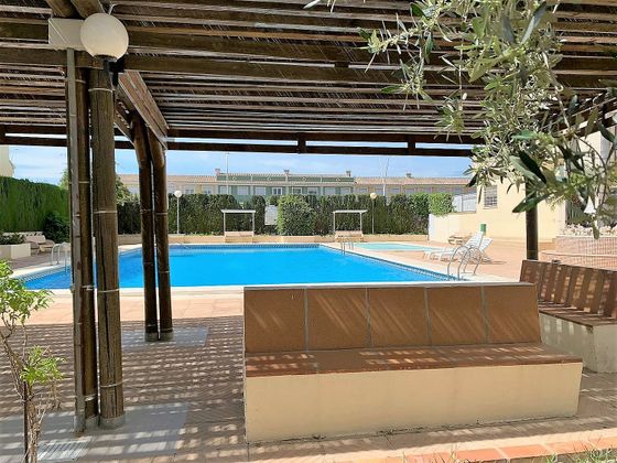 Foto 1 de Casa en venta en Playa de Gandia de 5 habitaciones con terraza y piscina