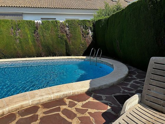 Foto 1 de Casa en venda a Playa de Gandia de 3 habitacions amb terrassa i piscina