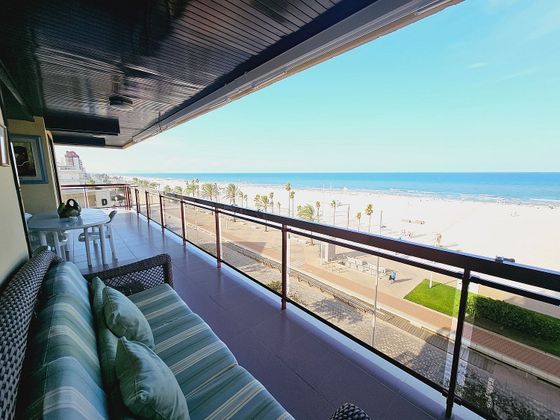 Foto 1 de Piso en venta en Playa de Gandia de 4 habitaciones con terraza y piscina