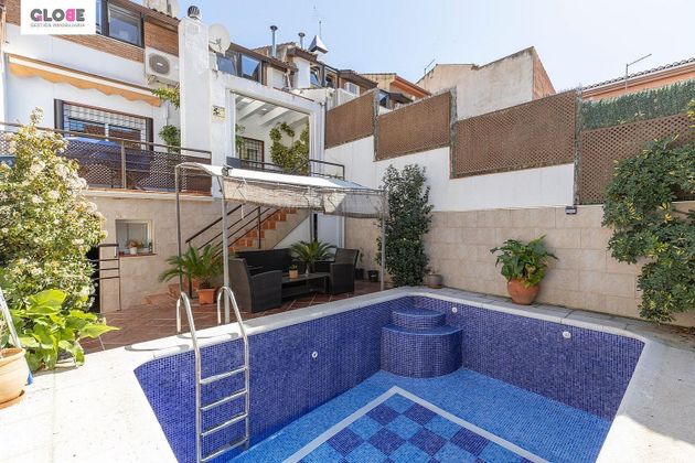 Foto 1 de Venta de casa en Cúllar Vega de 3 habitaciones con terraza y piscina